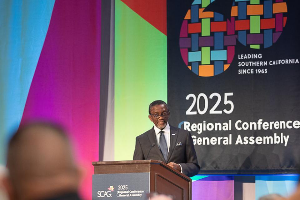 SCAG Executive Director Kome Ajise speaking from the podium. 